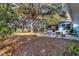 Beautiful backyard with mature trees and a picnic table at 530 Mckenzie Rd, Lake Helen, FL 32744