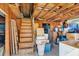 The garage offers ample storage and workspace, with a staircase leading to a loft area at 530 Mckenzie Rd, Lake Helen, FL 32744