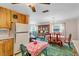 View of the kitchen table, dining room set, hutch, and living room at 530 Mckenzie Rd, Lake Helen, FL 32744