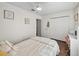 Serene bedroom featuring hardwood floors, a ceiling fan, and ample closet space at 711 Briarwood Dr, Winter Springs, FL 32708