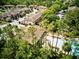 Aerial view of the community showcasing the pool, surrounding homes, and landscaped grounds at 8141 Roseville Blvd, Davenport, FL 33896