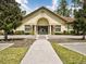 Community clubhouse boasts great curb appeal and a welcoming entrance at 8141 Roseville Blvd, Davenport, FL 33896