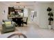 Open-concept living space flows into the dining area and kitchen with tile floors at 8141 Roseville Blvd, Davenport, FL 33896