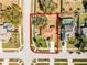An aerial view shows the property in a quiet neighborhood with mature trees and well-maintained lawns at 600 Park Valley Cir, Minneola, FL 34715