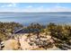 Scenic view of the lake and beach with a fishing pier at 600 Park Valley Cir, Minneola, FL 34715