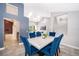 Bright dining room with modern lighting, furniture, and an open floorplan at 1008 Turtle Creek Dr, Oviedo, FL 32765