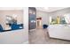Bright open-concept floorplan with neutral paint, tile floors, and modern furnishings at 1008 Turtle Creek Dr, Oviedo, FL 32765