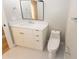 Bathroom featuring a modern vanity with stylish fixtures and a white toilet at 10142 Richardson Ct, Orlando, FL 32825