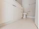 Modern bathroom with white vanity and tiled floors at 10142 Richardson Ct, Orlando, FL 32825