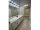 Bathroom featuring vanity with light countertops and hardware at 10446 Stone Glen Dr, Orlando, FL 32825