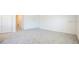 Large bedroom featuring plush carpeting and ample natural light at 113 Carlisle Ct, Kissimmee, FL 34758