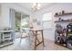 Bright eat-in kitchen featuring sliding door to backyard patio, and well-lit breakfast nook at 1139 Sand Creek Loop, Ocoee, FL 34761