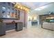 View from dining area to open kitchen and living room; showcasing modern layout and design at 1139 Sand Creek Loop, Ocoee, FL 34761