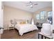 Spacious main bedroom with vaulted ceilings, ensuite bathroom access, and hardwood floors at 1139 Sand Creek Loop, Ocoee, FL 34761