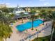 Inviting community pool with lounge chairs and a nearby clubhouse at 1338 Seven Eagles Ct # 302, Reunion, FL 34747