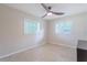 Bright bedroom with terrazzo flooring, modern ceiling fan, and light filled windows at 1361 Hobson St, Longwood, FL 32750