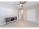 Bedroom featuring modern ceiling fan, sliding closet doors and accent furniture at 1361 Hobson St, Longwood, FL 32750