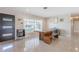 Inviting dining room features a rustic wooden table set and view of the entry door at 1361 Hobson St, Longwood, FL 32750