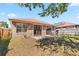 Exterior showing a backyard patio area perfect for outdoor dining at 1870 Bridgeview Cir, Orlando, FL 32824