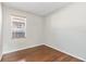 Clean, empty bedroom with wood floors at 1870 Bridgeview Cir, Orlando, FL 32824