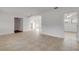 An open concept living space with tile floors, providing ample room for furniture at 2130 Pope Ave, South Daytona, FL 32119