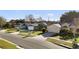 Street view showcasing the homes, driveways, and mature landscaping at 2417 Hybrid Dr, Kissimmee, FL 34758