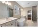 Elegant bathroom featuring a soaking tub, dual vanities, and a walk-in shower at 2620 Cedar Shake Ct, Oviedo, FL 32765