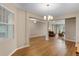 Bright and airy living space featuring wood flooring, neutral colors, and an open layout at 2620 Cedar Shake Ct, Oviedo, FL 32765