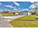 A street view of the home, showcasing its well-maintained lawn at 2844 Sw 162Nd Street Rd, Ocala, FL 34473