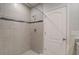 Tiled walk-in shower featuring decorative accent tiles at 315 Marquee Dr, Kissimmee, FL 34758