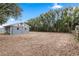 Exterior view of a barn, showcasing its functional design and access to surrounding grounds at 37224 Apiary Rd, Grand Island, FL 32735