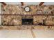 The fireplace is made of natural stone and has a log storage area at 37224 Apiary Rd, Grand Island, FL 32735