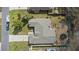 Aerial view of a home with a fenced yard, trampoline, and long driveway at 4100 Cannon Ct, Kissimmee, FL 34746