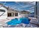 Sparkling swimming pool and patio, with large screened-in enclosure at 418 Laurenburg Ln, Ocoee, FL 34761