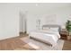 Bright, airy bedroom with a king-sized bed, walk-in closet and natural light at 4405 Sw 155Th Place Rd, Ocala, FL 34473