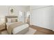 Cozy bedroom featuring a closet, soft lighting, and ensuite bathroom at 4405 Sw 155Th Place Rd, Ocala, FL 34473