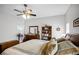 Comfortable main bedroom with natural light and ceiling fan at 53 High Vista Dr, Davenport, FL 33837