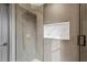 Modern bathroom shower with sleek fixtures, convenient niche and elegant design at 5447 Brookline Dr, Orlando, FL 32819