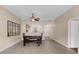 Bright dining area featuring a ceiling fan and a large window overlooking the neighborhood at 706 Westpark Way # 203, Celebration, FL 34747