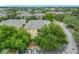 Overhead view of multi-Gathering residential community nestled among mature trees at 114 Vista Verdi Cir # 328, Lake Mary, FL 32746