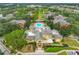 A stunning aerial view of the community center, pool, and lush landscaping in a residential neighborhood at 114 Vista Verdi Cir # 328, Lake Mary, FL 32746