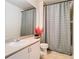 Bathroom featuring a vanity with sink and a shower tub combo with rod and curtain at 114 Vista Verdi Cir # 328, Lake Mary, FL 32746