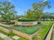 Stone entrance to Notting Hill community featuring manicured landscaping and clear signage at 114 Vista Verdi Cir # 328, Lake Mary, FL 32746