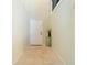 Bright entryway with a white front door, tile flooring and a decorative vase at 114 Vista Verdi Cir # 328, Lake Mary, FL 32746