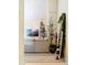 Cozy living room with a Christmas tree and a mirror with holiday garland at 114 Vista Verdi Cir # 328, Lake Mary, FL 32746