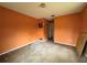 Vacant bedroom with damaged walls offers a refurbishment project at 115 S Lake Pleasant Rd, Apopka, FL 32703