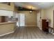 Spacious living room featuring tile flooring, neutral walls, and an open floor plan at 121 Loma Bonita Dr, Davenport, FL 33837