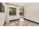 Bedroom with tile flooring, a ceiling fan and French doors that open to pool area at 135 James Pl, Maitland, FL 32751