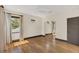 Bedroom featuring hardwood floors, natural light from the windows and mirrored closet at 135 James Pl, Maitland, FL 32751