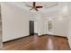 An inviting bedroom featuring a ceiling fan, wood floors, and recessed lighting at 135 James Pl, Maitland, FL 32751